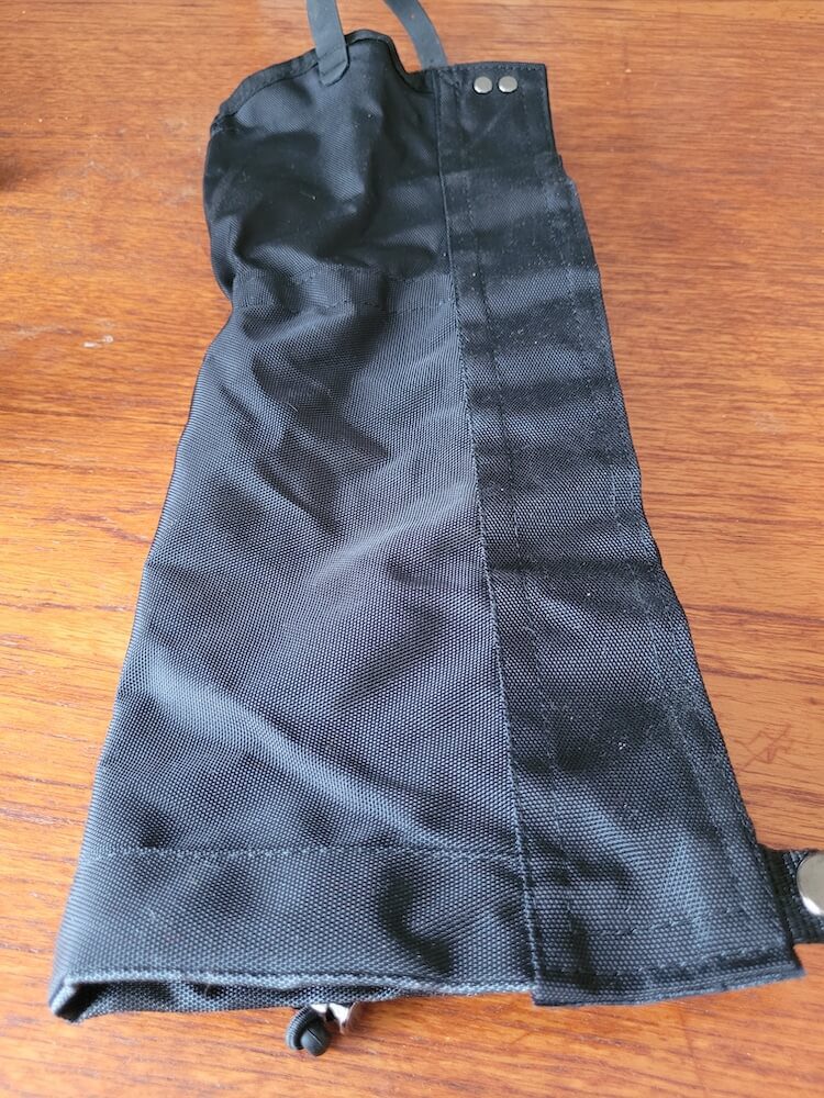 The other side of the gaiter, which is all black.
