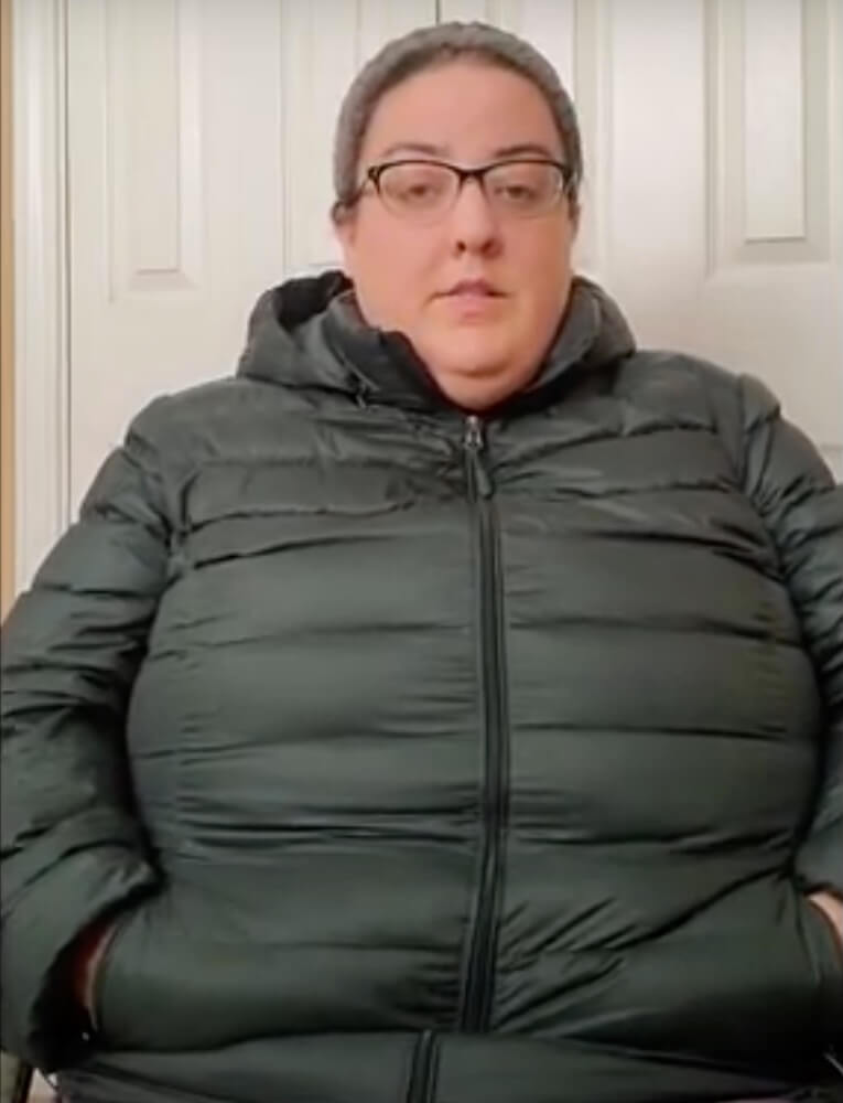 Ericka wearing the dark green 32 degrees jacket, zipped up